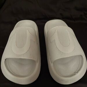 True Religion water/pool slides